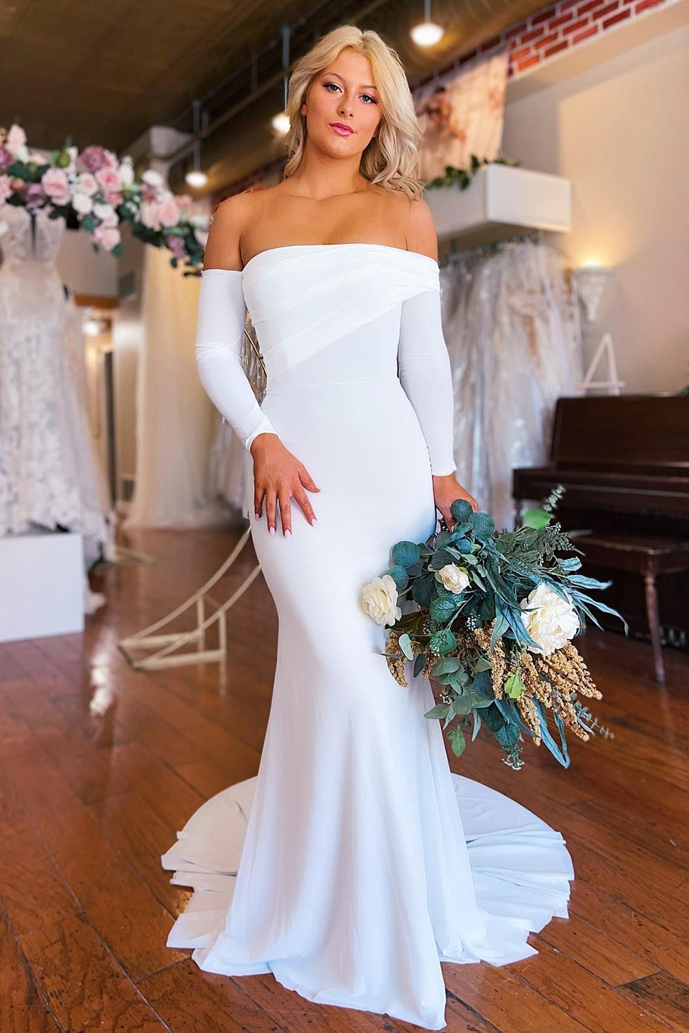 Plain white wedding dress with sleeves hotsell